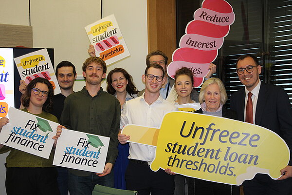Lib Dem MP with campaigners for fixing student finance