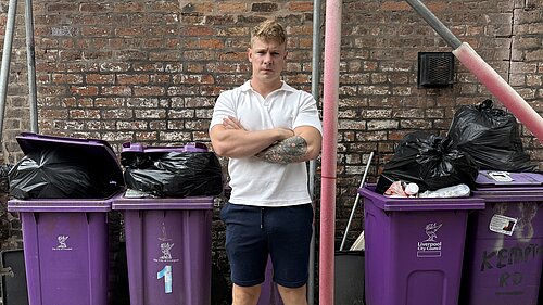 Carl Cashman in front of Bins